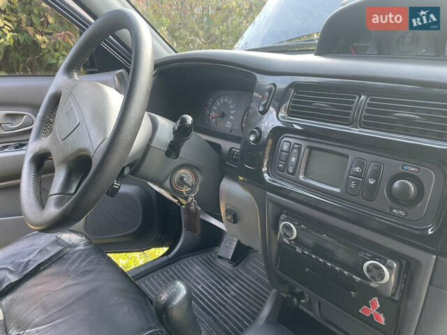 Черный Мицубиси Паджеро Спорт, объемом двигателя 3 л и пробегом 244 тыс. км за 7800 $, фото 13 на Automoto.ua