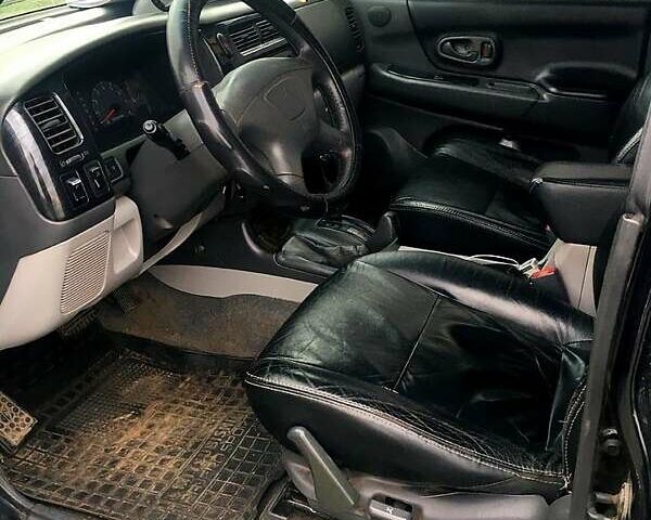 Черный Мицубиси Паджеро Спорт, объемом двигателя 3 л и пробегом 383 тыс. км за 7000 $, фото 6 на Automoto.ua