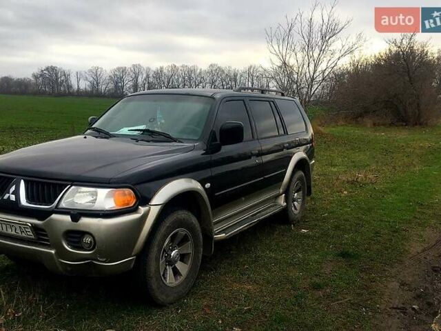 Черный Мицубиси Паджеро Спорт, объемом двигателя 3 л и пробегом 383 тыс. км за 7000 $, фото 1 на Automoto.ua