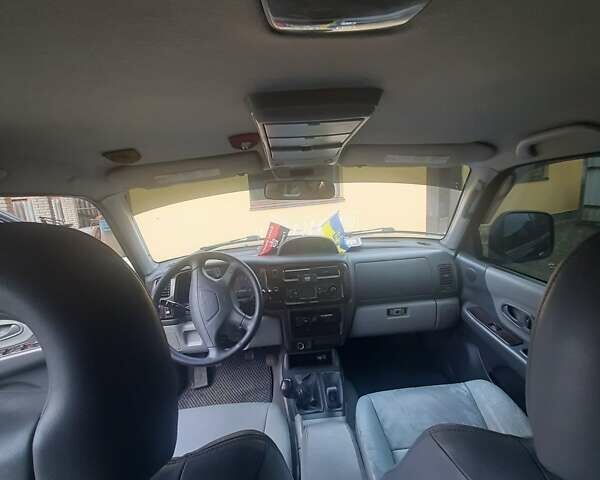 Чорний Міцубісі Паджеро Спорт, об'ємом двигуна 3 л та пробігом 230 тис. км за 8000 $, фото 6 на Automoto.ua