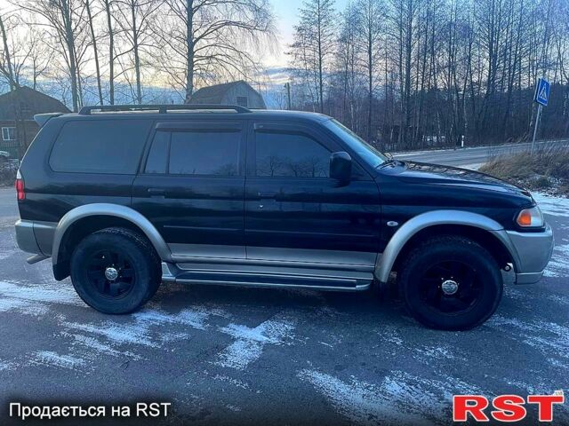 Черный Мицубиси Паджеро Спорт, объемом двигателя 3 л и пробегом 311 тыс. км за 6899 $, фото 7 на Automoto.ua
