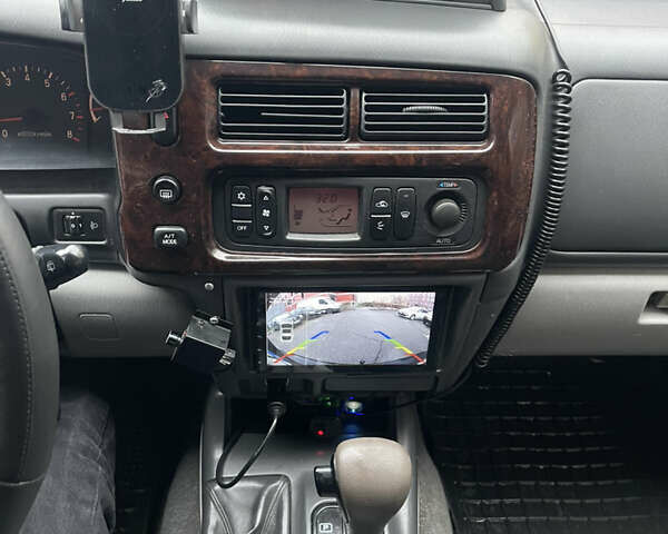 Черный Мицубиси Паджеро Спорт, объемом двигателя 3 л и пробегом 300 тыс. км за 5300 $, фото 15 на Automoto.ua