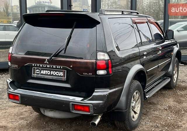 Черный Мицубиси Паджеро Спорт, объемом двигателя 3 л и пробегом 239 тыс. км за 7790 $, фото 7 на Automoto.ua