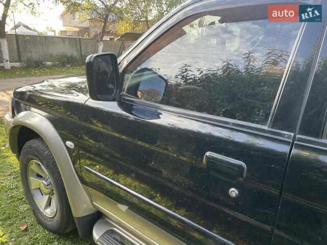 Черный Мицубиси Паджеро Спорт, объемом двигателя 3 л и пробегом 244 тыс. км за 7800 $, фото 21 на Automoto.ua