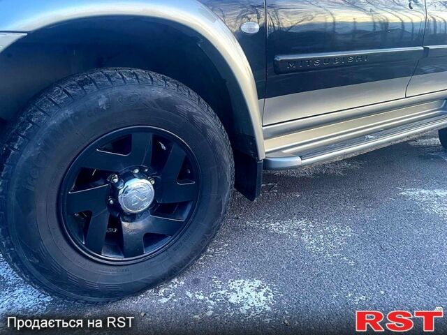 Черный Мицубиси Паджеро Спорт, объемом двигателя 3 л и пробегом 311 тыс. км за 6899 $, фото 8 на Automoto.ua