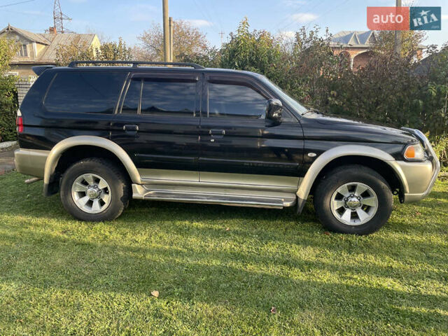 Черный Мицубиси Паджеро Спорт, объемом двигателя 3 л и пробегом 244 тыс. км за 7800 $, фото 32 на Automoto.ua