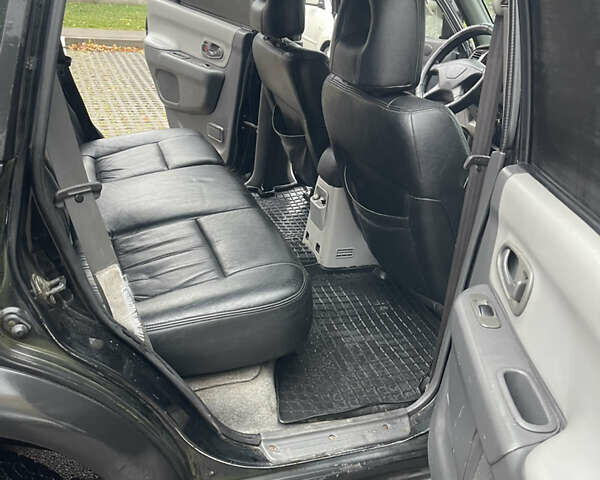 Черный Мицубиси Паджеро Спорт, объемом двигателя 3 л и пробегом 300 тыс. км за 5300 $, фото 13 на Automoto.ua