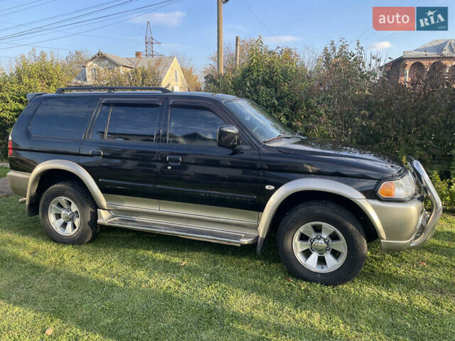 Черный Мицубиси Паджеро Спорт, объемом двигателя 3 л и пробегом 244 тыс. км за 7800 $, фото 33 на Automoto.ua