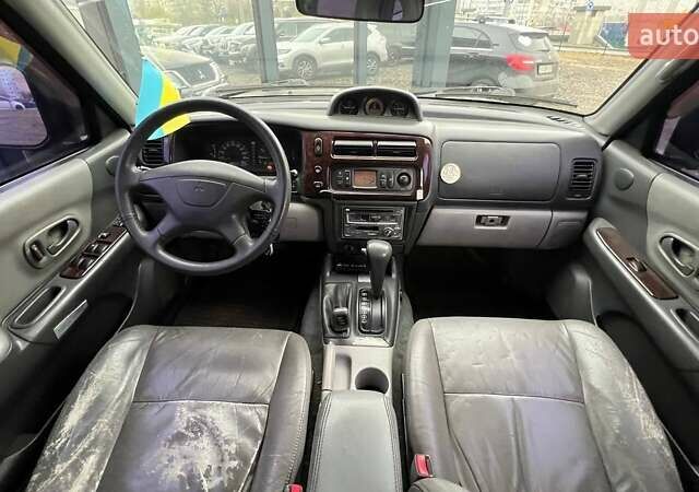 Черный Мицубиси Паджеро Спорт, объемом двигателя 3 л и пробегом 239 тыс. км за 7790 $, фото 23 на Automoto.ua