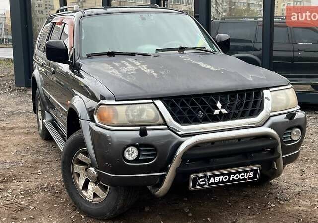 Черный Мицубиси Паджеро Спорт, объемом двигателя 3 л и пробегом 239 тыс. км за 7790 $, фото 6 на Automoto.ua