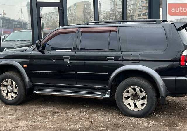 Черный Мицубиси Паджеро Спорт, объемом двигателя 3 л и пробегом 239 тыс. км за 7790 $, фото 3 на Automoto.ua