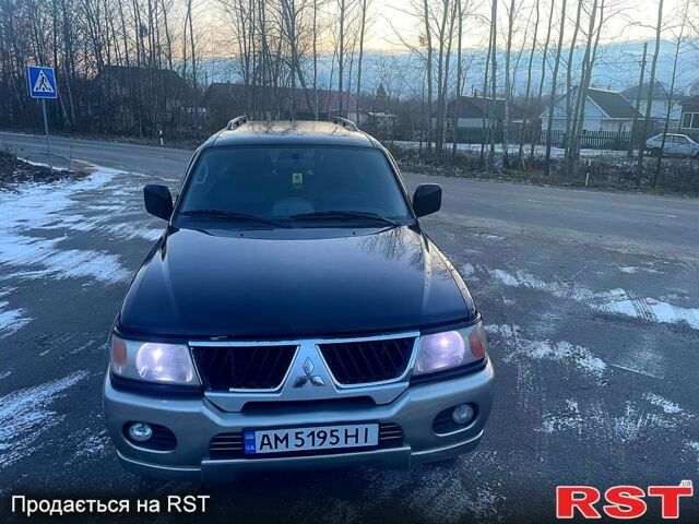 Черный Мицубиси Паджеро Спорт, объемом двигателя 3 л и пробегом 311 тыс. км за 6899 $, фото 6 на Automoto.ua