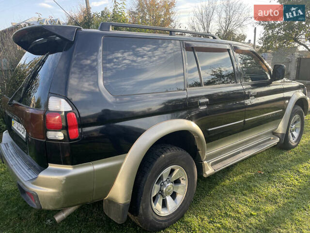 Черный Мицубиси Паджеро Спорт, объемом двигателя 3 л и пробегом 244 тыс. км за 7800 $, фото 28 на Automoto.ua