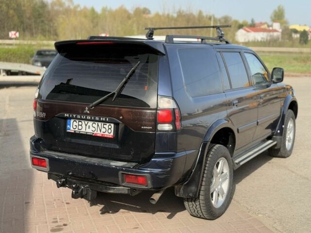 Мицубиси Паджеро Спорт 2004 в Сумах на Automoto.ua Черный Мицубиси Паджеро Спорт, объемом двигателя 0 л и пробегом 289 тыс. км за 3000 $, фото 5 на Automoto.ua