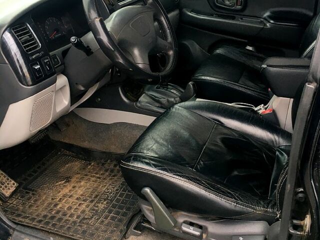 Чорний Міцубісі Паджеро Спорт, об'ємом двигуна 3 л та пробігом 383 тис. км за 7000 $, фото 7 на Automoto.ua