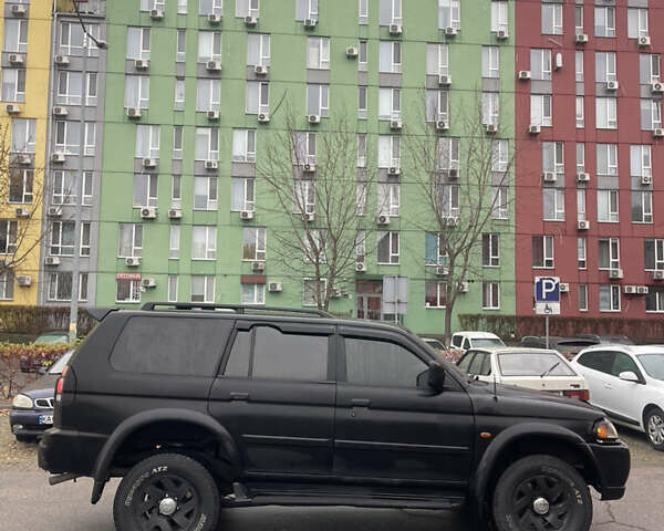 Черный Мицубиси Паджеро Спорт, объемом двигателя 3 л и пробегом 300 тыс. км за 5300 $, фото 5 на Automoto.ua