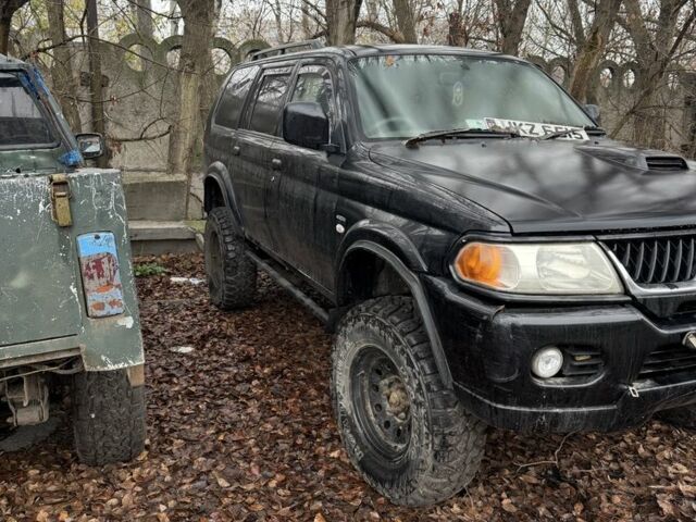 Черный Мицубиси Паджеро Спорт, объемом двигателя 2.5 л и пробегом 200 тыс. км за 4200 $, фото 2 на Automoto.ua