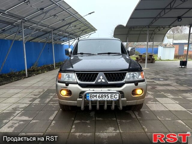 Черный Мицубиси Паджеро Спорт, объемом двигателя 3 л и пробегом 164 тыс. км за 8600 $, фото 1 на Automoto.ua