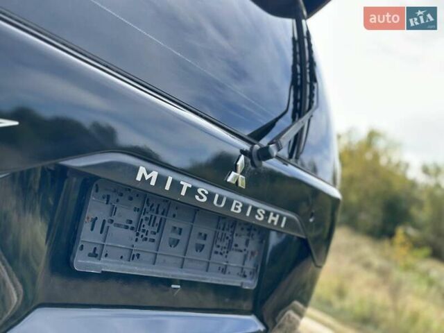 Черный Мицубиси Паджеро Спорт, объемом двигателя 3 л и пробегом 250 тыс. км за 8300 $, фото 24 на Automoto.ua