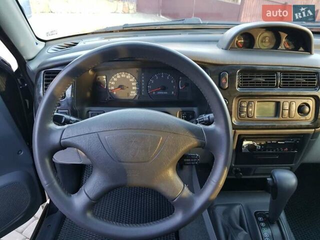 Черный Мицубиси Паджеро Спорт, объемом двигателя 3 л и пробегом 176 тыс. км за 8950 $, фото 47 на Automoto.ua