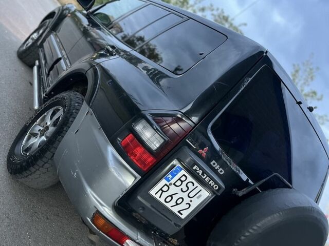 Чорний Міцубісі Паджеро Спорт, об'ємом двигуна 3.2 л та пробігом 200 тис. км за 3700 $, фото 5 на Automoto.ua