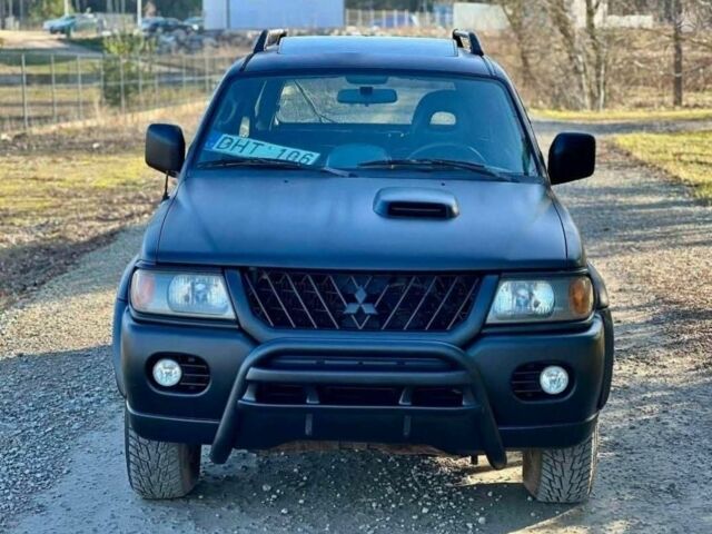 Черный Мицубиси Паджеро Спорт, объемом двигателя 2.5 л и пробегом 239 тыс. км за 2950 $, фото 3 на Automoto.ua