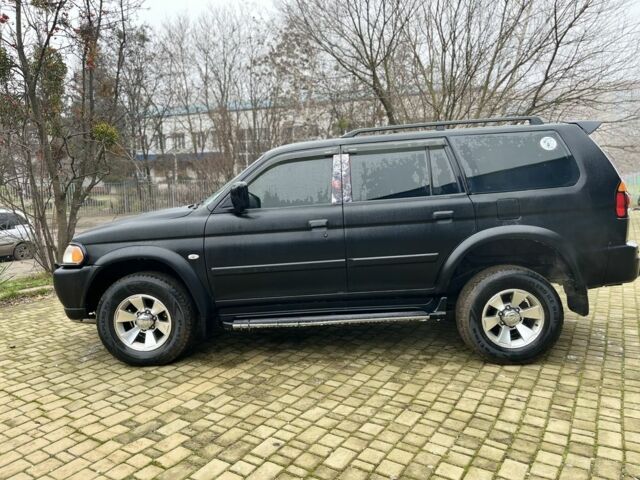 Чорний Міцубісі Паджеро Спорт, об'ємом двигуна 3 л та пробігом 200 тис. км за 5500 $, фото 2 на Automoto.ua