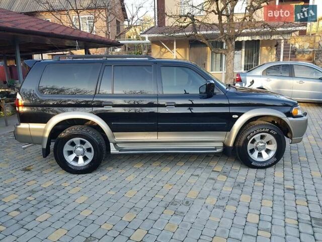 Черный Мицубиси Паджеро Спорт, объемом двигателя 3 л и пробегом 176 тыс. км за 8950 $, фото 7 на Automoto.ua