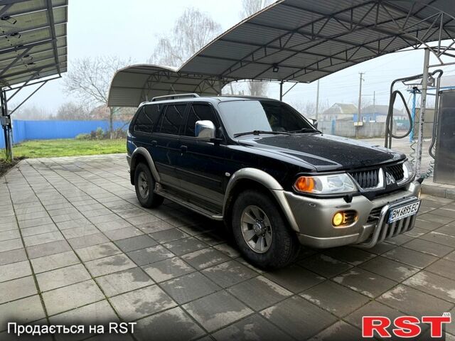 Черный Мицубиси Паджеро Спорт, объемом двигателя 3 л и пробегом 164 тыс. км за 8600 $, фото 2 на Automoto.ua