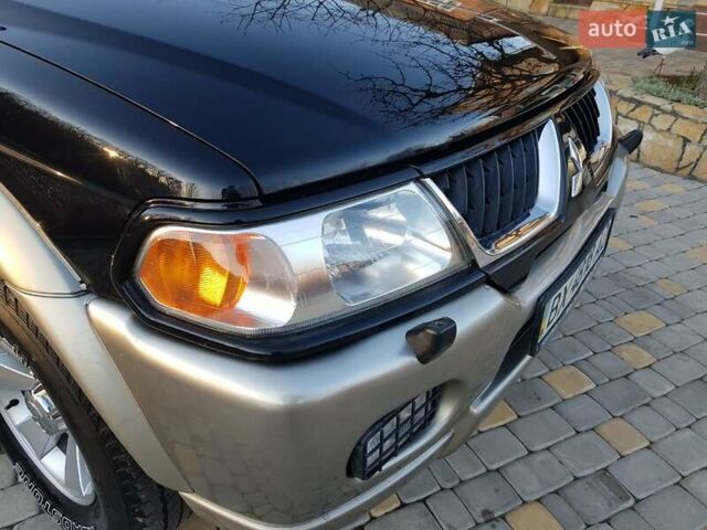 Черный Мицубиси Паджеро Спорт, объемом двигателя 3 л и пробегом 176 тыс. км за 8950 $, фото 10 на Automoto.ua