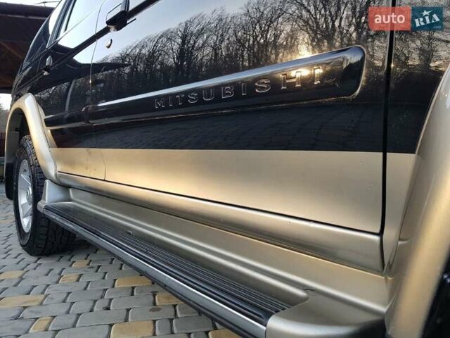 Черный Мицубиси Паджеро Спорт, объемом двигателя 3 л и пробегом 176 тыс. км за 8950 $, фото 24 на Automoto.ua