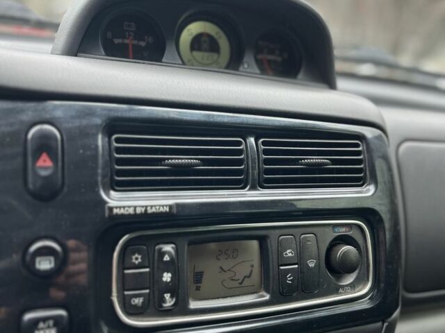 Чорний Міцубісі Паджеро Спорт, об'ємом двигуна 3 л та пробігом 200 тис. км за 5500 $, фото 13 на Automoto.ua