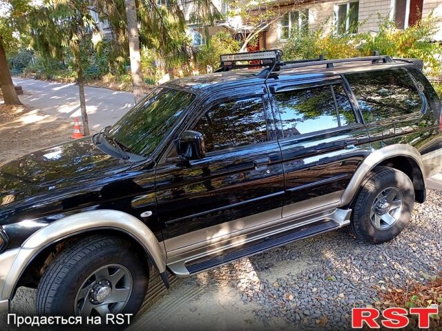 Чорний Міцубісі Паджеро Спорт, об'ємом двигуна 3 л та пробігом 180 тис. км за 8200 $, фото 1 на Automoto.ua