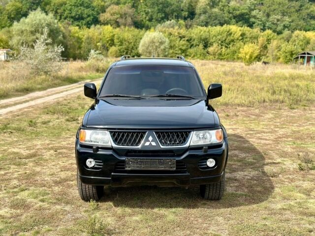 Черный Мицубиси Паджеро Спорт, объемом двигателя 3 л и пробегом 250 тыс. км за 8300 $, фото 2 на Automoto.ua