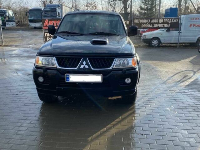 Чорний Міцубісі Паджеро Спорт, об'ємом двигуна 2.5 л та пробігом 209 тис. км за 8300 $, фото 1 на Automoto.ua