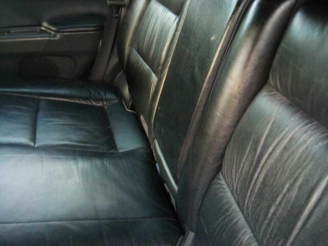 Чорний Міцубісі Паджеро Спорт, об'ємом двигуна 2.5 л та пробігом 209 тис. км за 8300 $, фото 6 на Automoto.ua