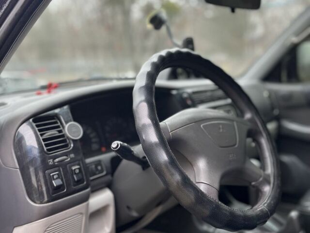 Чорний Міцубісі Паджеро Спорт, об'ємом двигуна 3 л та пробігом 200 тис. км за 5500 $, фото 12 на Automoto.ua