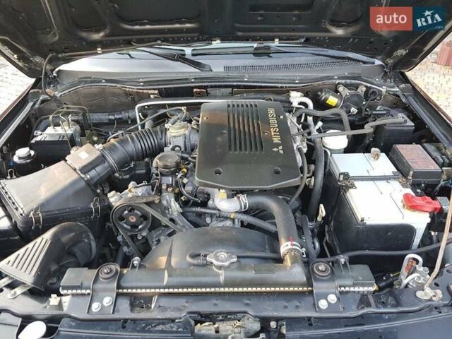 Черный Мицубиси Паджеро Спорт, объемом двигателя 3 л и пробегом 176 тыс. км за 8950 $, фото 39 на Automoto.ua