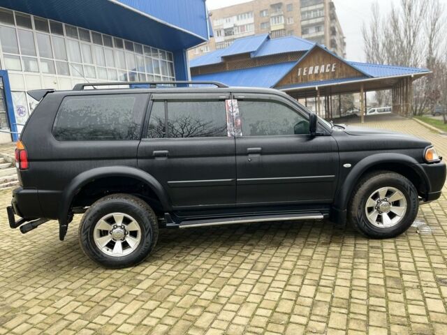 Чорний Міцубісі Паджеро Спорт, об'ємом двигуна 3 л та пробігом 200 тис. км за 5500 $, фото 6 на Automoto.ua