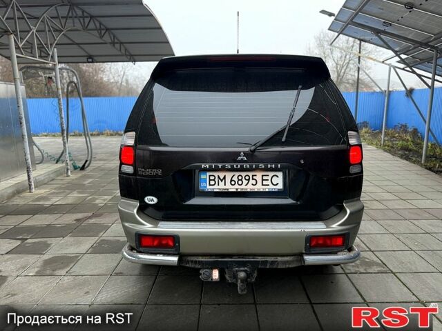 Черный Мицубиси Паджеро Спорт, объемом двигателя 3 л и пробегом 164 тыс. км за 8600 $, фото 4 на Automoto.ua