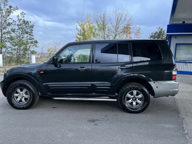 Чорний Міцубісі Паджеро Спорт, об'ємом двигуна 3.2 л та пробігом 200 тис. км за 3700 $, фото 6 на Automoto.ua