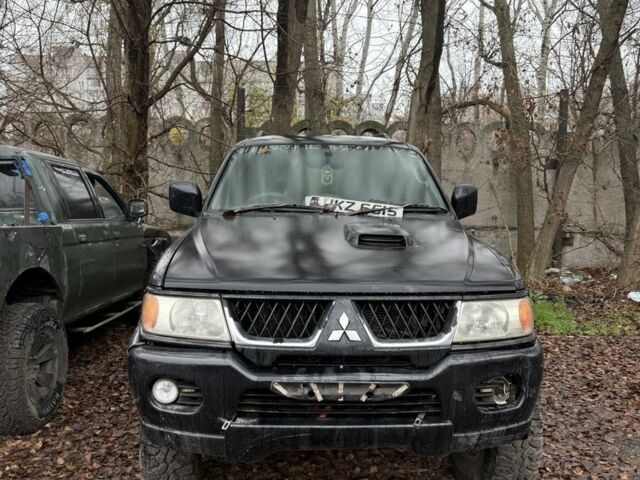 Черный Мицубиси Паджеро Спорт, объемом двигателя 2.5 л и пробегом 200 тыс. км за 4200 $, фото 4 на Automoto.ua