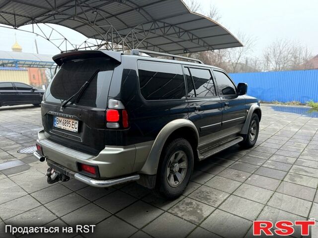 Черный Мицубиси Паджеро Спорт, объемом двигателя 3 л и пробегом 164 тыс. км за 8600 $, фото 3 на Automoto.ua