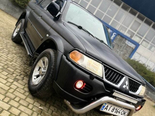 Чорний Міцубісі Паджеро Спорт, об'ємом двигуна 3 л та пробігом 200 тис. км за 5500 $, фото 7 на Automoto.ua