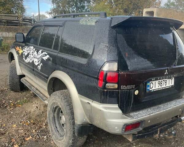 Черный Мицубиси Паджеро Спорт, объемом двигателя 2.97 л и пробегом 200 тыс. км за 4000 $, фото 4 на Automoto.ua
