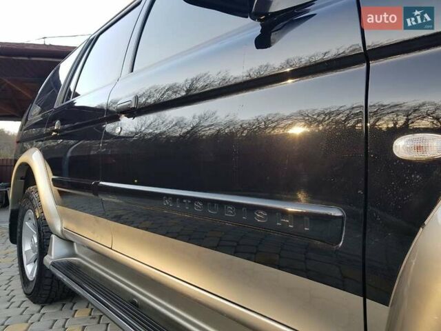 Черный Мицубиси Паджеро Спорт, объемом двигателя 3 л и пробегом 176 тыс. км за 8950 $, фото 28 на Automoto.ua