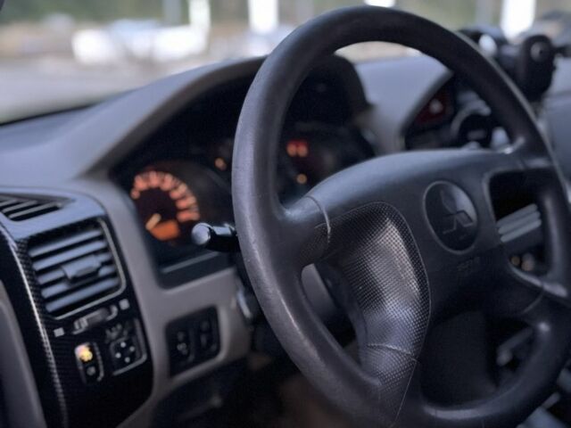 Чорний Міцубісі Паджеро Спорт, об'ємом двигуна 3.2 л та пробігом 200 тис. км за 3700 $, фото 7 на Automoto.ua