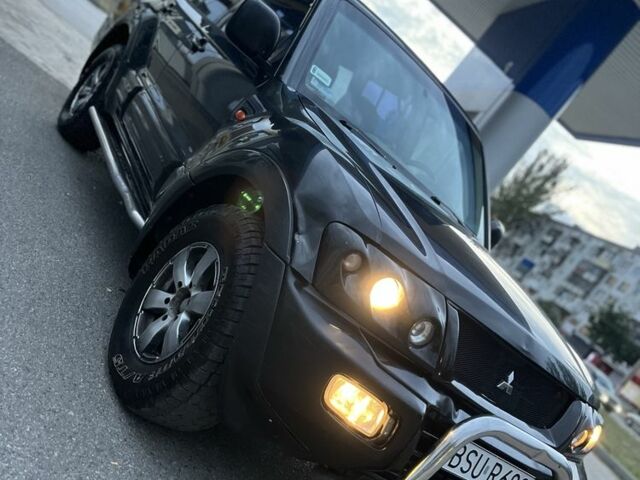 Чорний Міцубісі Паджеро Спорт, об'ємом двигуна 3.2 л та пробігом 200 тис. км за 3700 $, фото 1 на Automoto.ua