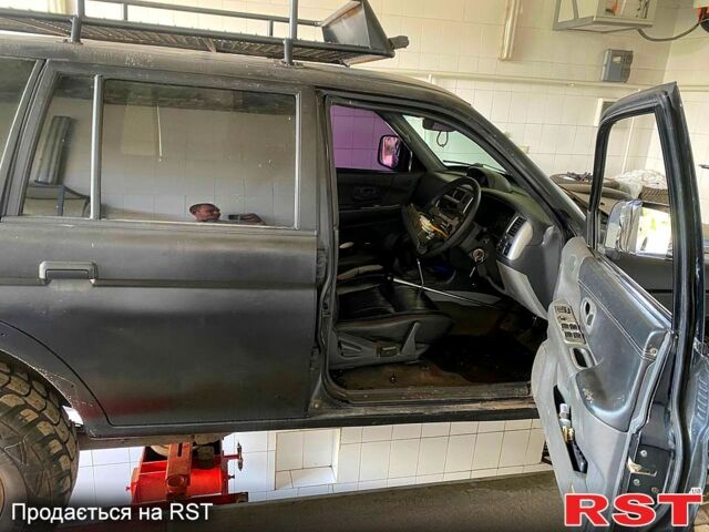 Черный Мицубиси Паджеро Спорт, объемом двигателя 3 л и пробегом 100 тыс. км за 4500 $, фото 4 на Automoto.ua