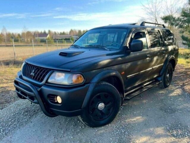 Черный Мицубиси Паджеро Спорт, объемом двигателя 2.5 л и пробегом 239 тыс. км за 2950 $, фото 2 на Automoto.ua